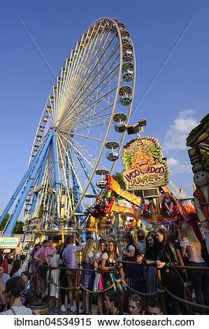 Stock Photography - Visitors at the Ferris Wheel, Erlanger Bergkirchweih, Erlangen, Middle Franconia, Franconia, Bavaria, Germany, Europe. Fotosearch