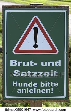Stock Photo - Warning sign for dog owners, Bavaria, Germany, Europe. Fotosearch