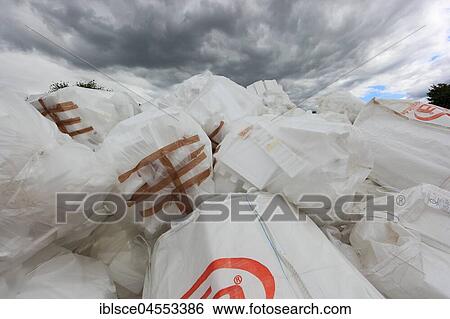 Stock Photograph - Waste disposal, recycling warehouse, waste of insulation, styrophor, packed in plastic bags, Germany, Europe. Fotosearch