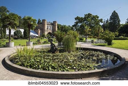 Water lily basin in front of the arched building, botanical garden in Karlsruhe Palace Gardens, Karlsruhe, Upper Swabia, Baden-Württemberg, Germany, Europe View Large Photo Image Stock Image - Water lily basin in front of the arched building, botanical garden in Karlsruhe Palace Gardens, Karlsruhe, Upper Swabia, Baden-Württemberg, Germany, Europe. Fotosearch