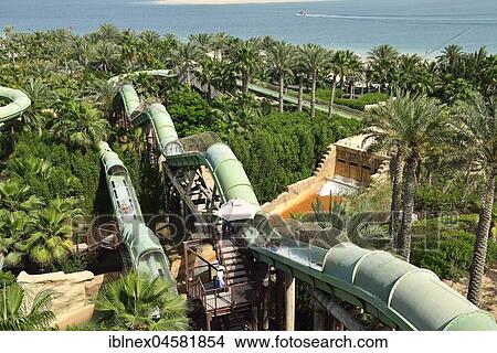 Water slide in Aquaventure Park at Atlantis Hotel, The Palm Jumeirah, Dubai, United Arab Emirates, Asia View Large Photo Image Picture - Water slide in Aquaventure Park at Atlantis Hotel, The Palm Jumeirah, Dubai, United Arab Emirates, Asia. Fotosearch