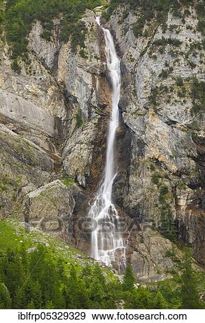 Stock Photo - Waterfall in the Simmental, Bern, Bernese Oberland, Switzerland, Europe. Fotosearch