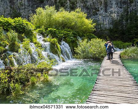 Waterfall, tourists on footbridge, Plitvice Lakes National Park, Plitvicka Jezera, Lika-Senj, Croatia, Europe View Large Photo Image Stock Image - Waterfall, tourists on footbridge, Plitvice Lakes National Park, Plitvicka Jezera, Lika-Senj, Croatia, Europe. Fotosearch