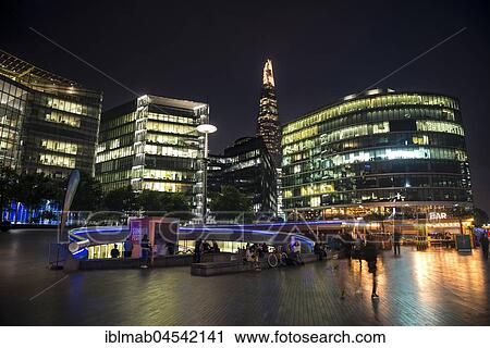 Stock Image - Waterfront at night, More London Riverside, The Shard at back, London, England, United Kingdom, Europe. Fotosearch