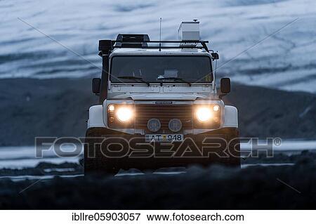 White Land Rover Jeep in front of a glacier, Vatnajökull glacier, Iceland, Europe View Large Photo Image Stock Photo - White Land Rover Jeep in front of a glacier, Vatnajökull glacier, Iceland, Europe. Fotosearch