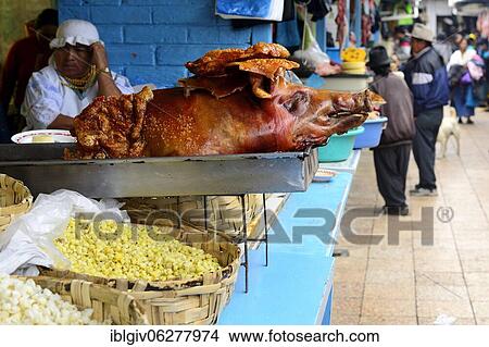Picture - Whole sucking pig at a market stall, Otavalo, Imbabura Province, Ecuador, South America. Fotosearch