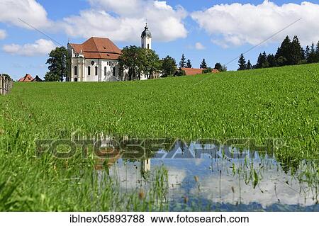 Wieskirche reflected in a puddle, Steingaden, Upper Bavaria, Bavaria, Germany, Europe View Large Photo Image Stock Photo - Wieskirche reflected in a puddle, Steingaden, Upper Bavaria, Bavaria, Germany, Europe. Fotosearch