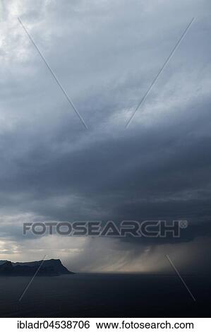 Stock Photograph - Winding storm, dark clouds, view from the Cape Peninsula to False Bay, Western Cape, South Africa, Africa. Fotosearch