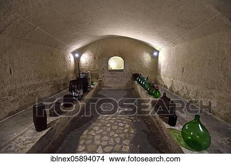Picture - Wine cellar in the Casa Grotta Museum, Matera, Basilicata, Italy, Europe. Fotosearch