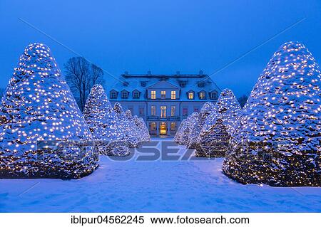 Stock Photography - Winery Schloss Wackerbarth with Christmas lights on snow, dawn, Radebeul, Saxony, Germany, Europe *** IMPORTANT: Only editorial use and for flyers, postcards or calendars representing the region. ***. Fotosearch