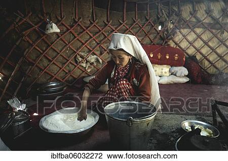 Woman kneading dough, preparation of flat bread, in front of her a kettle on a fireplace, yurt, bozai gumbaz, wakhan corridor, Badakhshan, Afghanistan, Asia View Large Photo Image Stock Image - Woman kneading dough, preparation of flat bread, in front of her a kettle on a fireplace, yurt, bozai gumbaz, wakhan corridor, Badakhshan, Afghanistan, Asia. Fotosearch