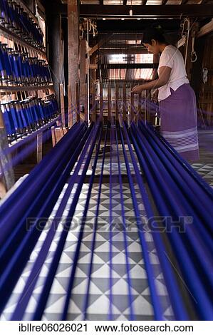 Woman pulling up colourful threads on loom, Lake Inle, Myanmar, Asia View Large Photo Image Stock Image - Woman pulling up colourful threads on loom, Lake Inle, Myanmar, Asia. Fotosearch