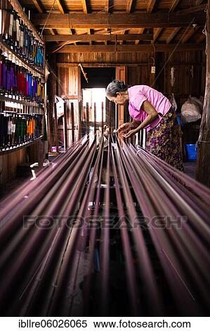 Woman pulling up colourful threads on loom, Lake Inle, Myanmar, Asia View Large Photo Image Stock Photography - Woman pulling up colourful threads on loom, Lake Inle, Myanmar, Asia. Fotosearch