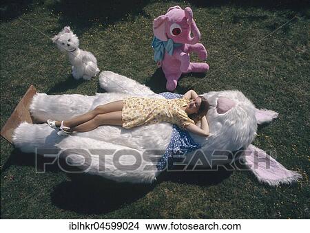 Picture - Woman with soft toys, England, Great Britain. Fotosearch