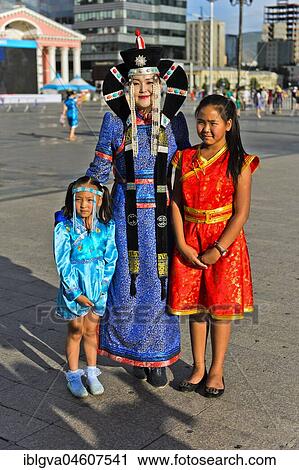 Woman with two children in traditional festive clothes, festival of the Mongolian national costume, Ulanbator, Mongolia, Asia View Large Photo Image Stock Image - Woman with two children in traditional festive clothes, festival of the Mongolian national costume, Ulanbator, Mongolia, Asia. Fotosearch