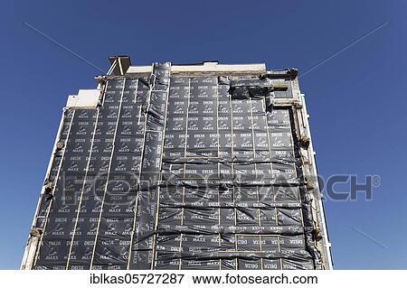 Wrapped, insulated fire protection wall next to a demolished residential building, construction site, Düsseldorf, North Rhine-Westphalia, Germany, Europe View Large Photo Image Stock Photo - Wrapped, insulated fire protection wall next to a demolished residential building, construction site, Düsseldorf, North Rhine-Westphalia, Germany, Europe. Fotosearch