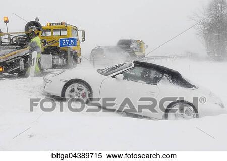 Accident on autobahn, Porsche in snowstorm, packed snow, Holzkirchen, Upper Bavaria, Bavaria, Germany, Europe View Large Photo Image Stock Photography - Accident on autobahn, Porsche in snowstorm, packed snow, Holzkirchen, Upper Bavaria, Bavaria, Germany, Europe. Fotosearch