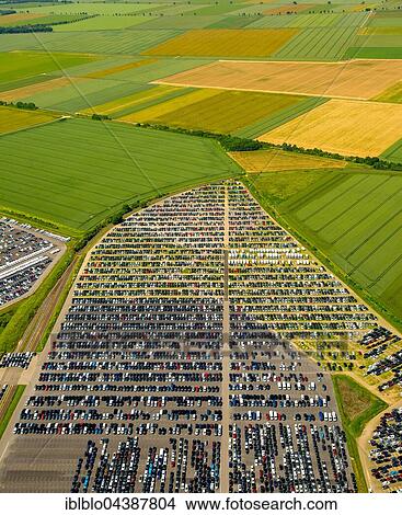 Picture - Aerial photograph, new car parking lot surrounded by fields, Citroen, Peugeot, Ford, Wallenius Wilhelmsen Logistics, Zülpich, Rhineland, North Rhine-Westphalia, Germany, Europe. Fotosearch