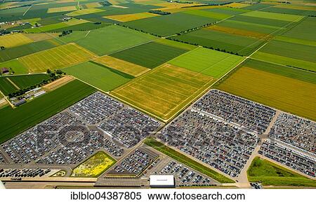 Aerial photograph, new car parking lot surrounded by fields, Citroen, Peugeot, Ford, Wallenius Wilhelmsen Logistics, Zülpich, Rhineland, North Rhine-Westphalia, Germany, Europe View Large Photo Image Stock Photography - Aerial photograph, new car parking lot surrounded by fields, Citroen, Peugeot, Ford, Wallenius Wilhelmsen Logistics, Zülpich, Rhineland, North Rhine-Westphalia, Germany, Europe. Fotosearch