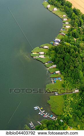 Aerial view, boathouses on Lake Krakow, Krakow Lakelands, Krakow am See, Mecklenburg Lake District, Mecklenburg-Western Pomerania, Germany, Europe View Large Photo Image Stock Image - Aerial view, boathouses on Lake Krakow, Krakow Lakelands, Krakow am See, Mecklenburg Lake District, Mecklenburg-Western Pomerania, Germany, Europe. Fotosearch
