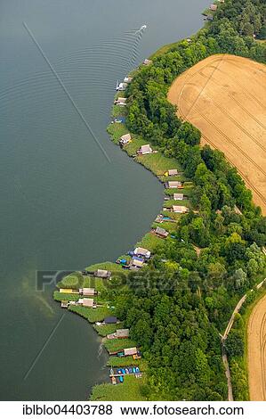 Aerial view, boathouses on Lake Krakow, Krakow Lakelands, Krakow am See, Mecklenburg Lake District, Mecklenburg-Western Pomerania, Germany, Europe View Large Photo Image Stock Photo - Aerial view, boathouses on Lake Krakow, Krakow Lakelands, Krakow am See, Mecklenburg Lake District, Mecklenburg-Western Pomerania, Germany, Europe. Fotosearch