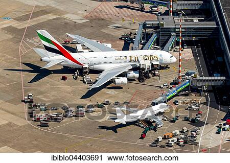 Aerial view, Düsseldorf Airport, A6-EOB Emirates Airbus A380-861 at gate, passenger boarding bridge, Düsseldorf, Rhineland, North Rhine-Westphalia, Germany, Europe View Large Photo Image Stock Image - Aerial view, Düsseldorf Airport, A6-EOB Emirates Airbus A380-861 at gate, passenger boarding bridge, Düsseldorf, Rhineland, North Rhine-Westphalia, Germany, Europe. Fotosearch