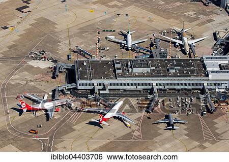 Aerial view, Düsseldorf Airport, EDDL, ground handling, passenger boarding bridges, Düsseldorf, Rhineland, North Rhine-Westphalia, Germany, Europe View Large Photo Image Stock Photograph - Aerial view, Düsseldorf Airport, EDDL, ground handling, passenger boarding bridges, Düsseldorf, Rhineland, North Rhine-Westphalia, Germany, Europe. Fotosearch