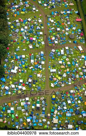 Aerial view of campers and tents at Ruhrpott Rodeo, Punk Festival, Music Festival at Schwarze Heide Bottrop Airport, Bottrop, Ruhr, North Rhine-Westphalia, Germany, Europe View Large Photo Image Stock Photo - Aerial view of campers and tents at Ruhrpott Rodeo, Punk Festival, Music Festival at Schwarze Heide Bottrop Airport, Bottrop, Ruhr, North Rhine-Westphalia, Germany, Europe. Fotosearch