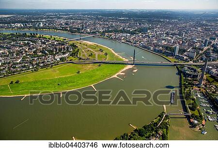 Aerial view of Rheinbogen Oberkassel, bridge over Rhine river bend, Rheinkniebrücke, Oberkassel Bridge, Düsseldorf, Rhineland, North Rhine-Westphalia, Germany, Europe View Large Photo Image Stock Photograph - Aerial view of Rheinbogen Oberkassel, bridge over Rhine river bend, Rheinkniebrücke, Oberkassel Bridge, Düsseldorf, Rhineland, North Rhine-Westphalia, Germany, Europe. Fotosearch