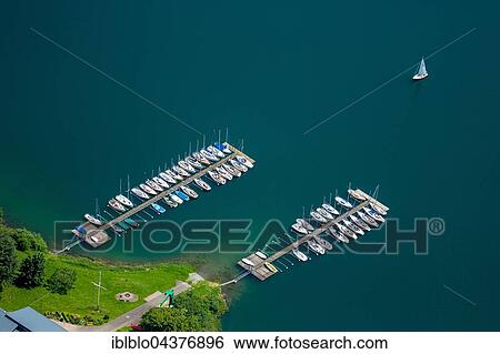Aerial view of sailboats on Lake Hennesee, seascape, Meschede, Sauerland, North Rhine-Westphalia, Germany, Europe View Large Photo Image Stock Photograph - Aerial view of sailboats on Lake Hennesee, seascape, Meschede, Sauerland, North Rhine-Westphalia, Germany, Europe. Fotosearch