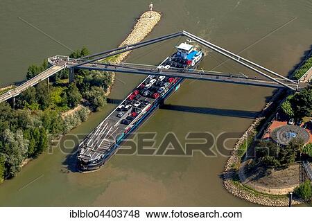 Aerial view of ship under bridge with Parliament, Rhine riverbank, Düsseldorf, Rhineland, North Rhine-Westphalia, Germany, Europe View Large Photo Image Stock Photo - Aerial view of ship under bridge with Parliament, Rhine riverbank, Düsseldorf, Rhineland, North Rhine-Westphalia, Germany, Europe. Fotosearch