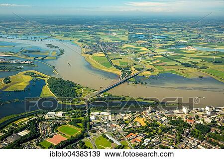 Aerial view, Rhine flood at the Lippe estuary, Rhine bridge, reconstruction of Lippe Wesel, Niederrhein, North Rhine-Westphalia, Germany, Europe View Large Photo Image Stock Photo - Aerial view, Rhine flood at the Lippe estuary, Rhine bridge, reconstruction of Lippe Wesel, Niederrhein, North Rhine-Westphalia, Germany, Europe. Fotosearch