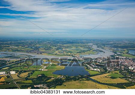 Stock Image - Aerial view, Rhine floods at the Lippe estuary, Niederrhein, North Rhine-Westphalia, Germany, Europe. Fotosearch