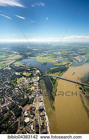 Aerial view, the Rhine flood at the Lippe estuary, Rhine bridge, reconstruction of Lippe Wesel, Niederrhein, North Rhine-Westphalia, Germany, Europe View Large Photo Image Stock Image - Aerial view, the Rhine flood at the Lippe estuary, Rhine bridge, reconstruction of Lippe Wesel, Niederrhein, North Rhine-Westphalia, Germany, Europe. Fotosearch