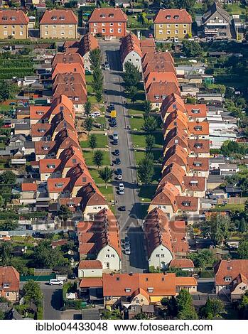 Stock Photo - Ahlen Ulmenhof, mine workers' settlement for Westfalen mine, miners settlement, colliery houses, structure of a village green settlement, garden city, Ahlen, Ruhr district, North Rhine-Westphalia, Germany, Europe. Fotosearch