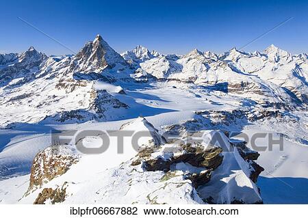 Alps, View Klein Matterhorn, Dent d'Herens, 4171 (m), Matterhorn, 4478 m, Dent blanche, 4357 m, Obergabelhorn, 4063 m, Zinalrothorn, 4221m, Weisshorn, 4505 m, Valais, Switzerland, Europe View Large Photo Image Stock Image - Alps, View Klein Matterhorn, Dent d'Herens, 4171 (m), Matterhorn, 4478 m, Dent blanche, 4357 m, Obergabelhorn, 4063 m, Zinalrothorn, 4221m, Weisshorn, 4505 m, Valais, Switzerland, Europe. Fotosearch