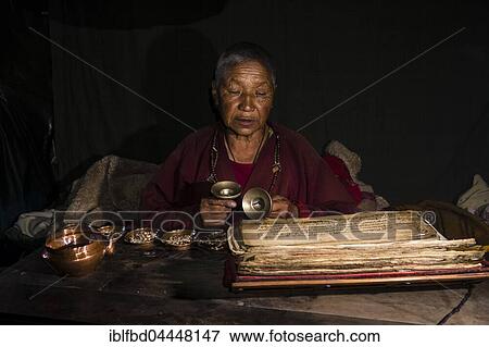 Stock Photo - Ani Chorten, daughter of Tashi Lama, is celebrating a religious ceremony, Praken Gompa, Manang, Manang District, Nepal, Asia. Fotosearch