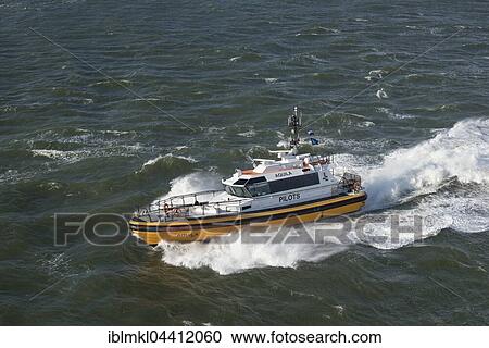 Stock Image - Aquila Pilots, boat vessel operations on the North Sea, Province of North Holland, The Netherlands, Europe. Fotosearch
