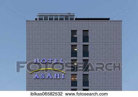 Asahi Hotel, illuminated lettering on the building, business hotel in the Japanese quarter of Düsseldorf, North Rhine-Westphalia, Germany, Europe View Large Photo Image Stock Image - Asahi Hotel, illuminated lettering on the building, business hotel in the Japanese quarter of Düsseldorf, North Rhine-Westphalia, Germany, Europe. Fotosearch