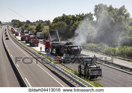 Asphalting new road surface, highway construction site of the A2 between Dortmund and Kamen, North Rhine-Westphalia, Germany, Europe View Large Photo Image Stock Photograph - Asphalting new road surface, highway construction site of the A2 between Dortmund and Kamen, North Rhine-Westphalia, Germany, Europe. Fotosearch