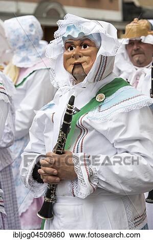 Aussee Carnival, men with masks and wind instrument, white robes, Trommelweiber, Bad Aussee, Styria, Austria, Europe View Large Photo Image Stock Image - Aussee Carnival, men with masks and wind instrument, white robes, Trommelweiber, Bad Aussee, Styria, Austria, Europe. Fotosearch
