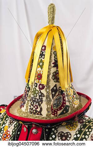 Stock Photograph - Ausseer Flinserl, hat with yellow ribbons, sequins, different appliqué designs, Bad Aussee, Styria, Austria, Europe. Fotosearch