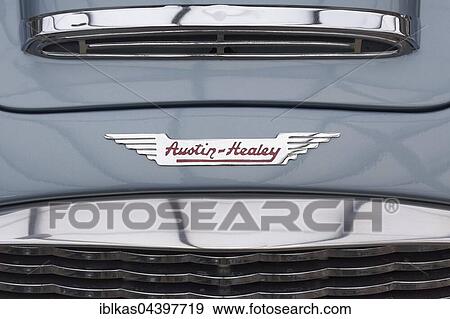 Austin Healey emblem with Logo on a Roadster, British classic car View Large Photo Image Stock Photo - Austin Healey emblem with Logo on a Roadster, British classic car. Fotosearch