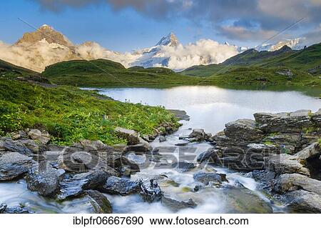 Stock Image - Bachalpsee, Wetterhorn, Schreckhorn, Finsteraarhorn, Switzerland, Swiss Alps, Schreckhorn, 4078 m, Finsteraarhorn, 4274m, Switzerland, Europe. Fotosearch