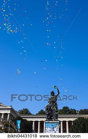 Stock Photo - Balloons over Bavaria, Oktoberfest, Munich, Bavaria, Germany, Europe. Fotosearch