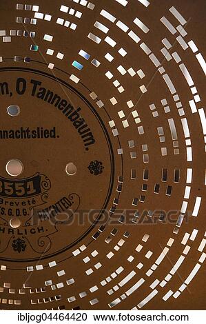 Stock Image - Barrel organ, perforated disk with the song O Tannenbaum, Grassau, Upper Bavaria, Bavaria, Germany, Europe. Fotosearch