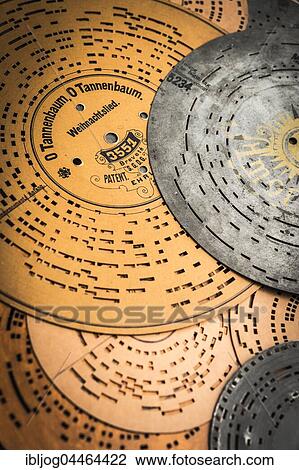 Barrel organ, perforated disks made of cardboard and metal with perforated pieces of music, O Tannenbaum on the left, Grassau, Upper Bavaria, Bavaria, Germany, Europe View Large Photo Image Stock Image - Barrel organ, perforated disks made of cardboard and metal with perforated pieces of music, O Tannenbaum on the left, Grassau, Upper Bavaria, Bavaria, Germany, Europe. Fotosearch