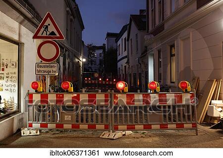 Barrier of a construction site at dusk, Bremen, Germany, Europe View Large Photo Image Stock Image - Barrier of a construction site at dusk, Bremen, Germany, Europe. Fotosearch