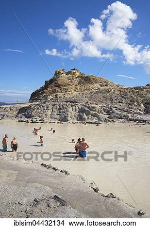 Bathers enjoying volcanic mud, hot springs, Vulcano Island, Aeolian Islands, Italy, Europe View Large Photo Image Picture - Bathers enjoying volcanic mud, hot springs, Vulcano Island, Aeolian Islands, Italy, Europe. Fotosearch