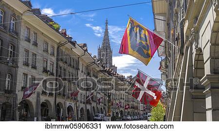Stock Image - Bern Cathedral, flags on houses in Bern Old Town, Inner City, Bern, Canton Bern, Switzerland, Europe. Fotosearch